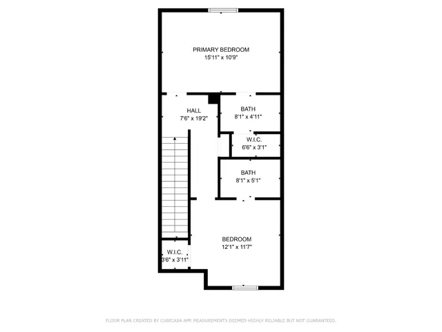 a picture of a bench in front of a wall