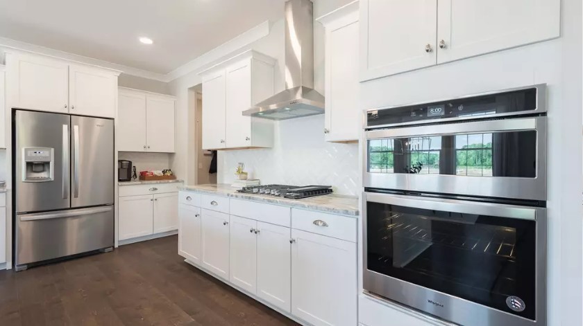 710 Conifer Dr Spring Hill Spring Hill, TN 37174 - Photo 7 of 22 a kitchen with stainless steel appliances granite countertop a stove a refrigerator and a stove