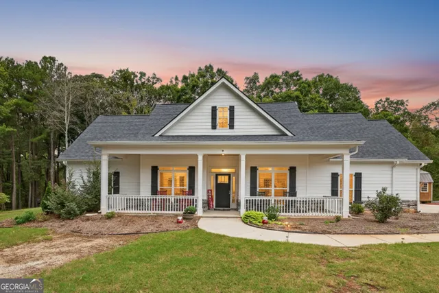 front view of a house with a yard