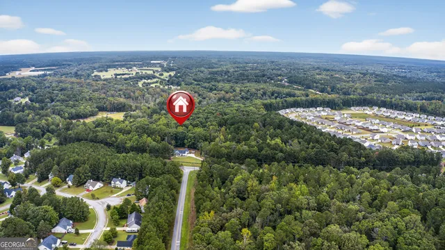 a room with furniture and wooden floor