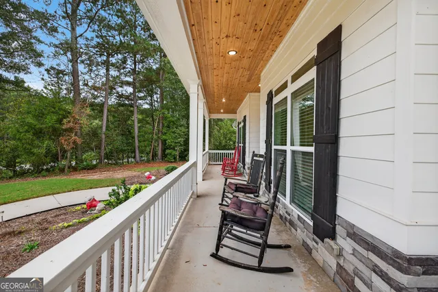 a view of a hallway with workspace