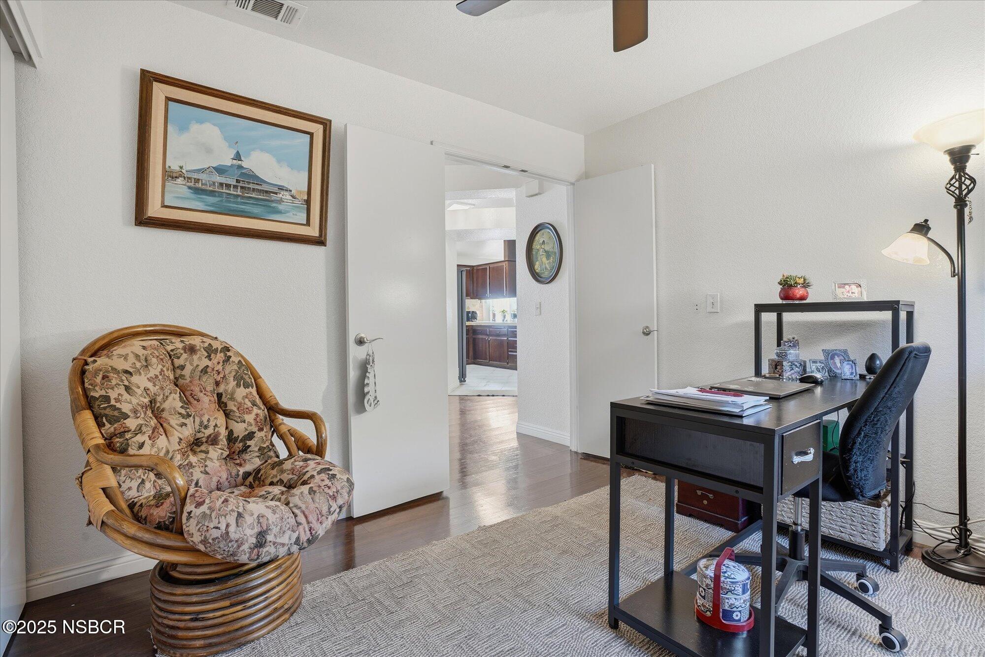 4300 Ridgecrest Street Santa Maria, CA 93455 - Photo 15 of 40 a view of a workspace with furniture and a potted plant