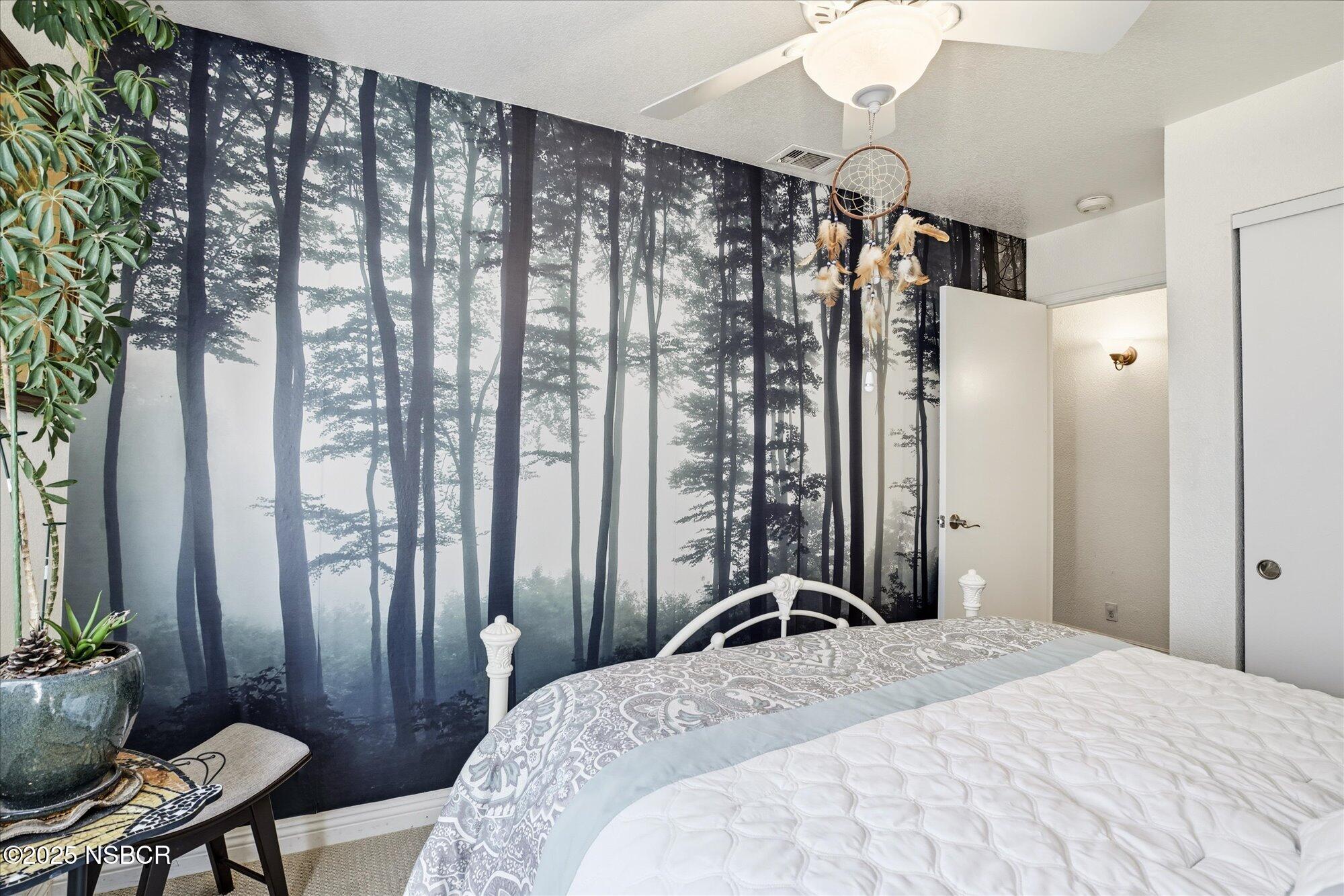 4300 Ridgecrest Street Santa Maria, CA 93455 - Photo 19 of 40 a bedroom with a bed and a table