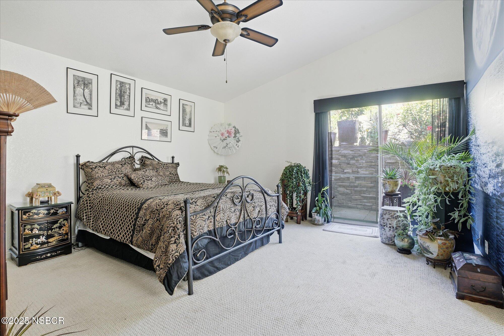 4300 Ridgecrest Street Santa Maria, CA 93455 - Photo 21 of 40 a bedroom with a bed and a potted plant
