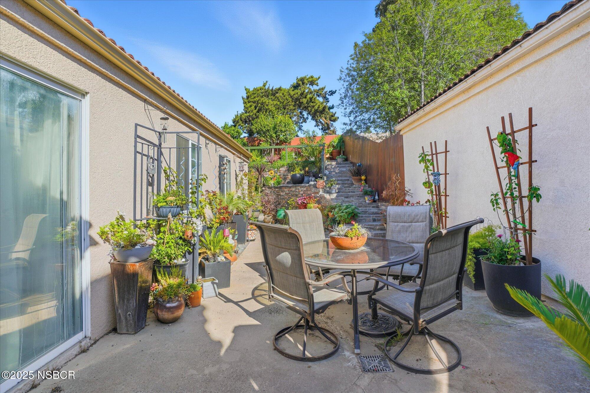 4300 Ridgecrest Street Santa Maria, CA 93455 - Photo 27 of 40 a view of a chairs and table in a patio