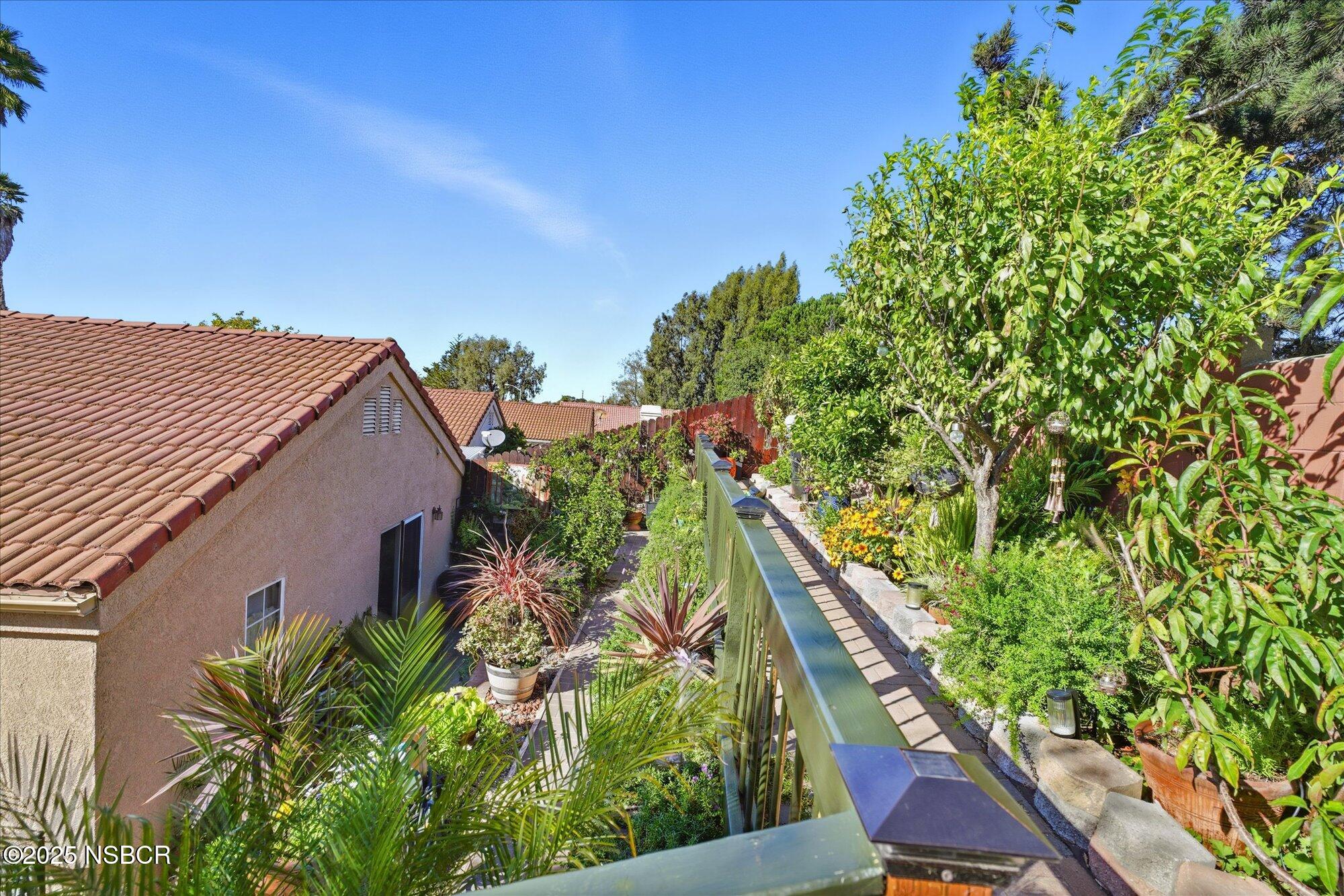 4300 Ridgecrest Street Santa Maria, CA 93455 - Photo 30 of 40 a backyard of a house with lots of green space