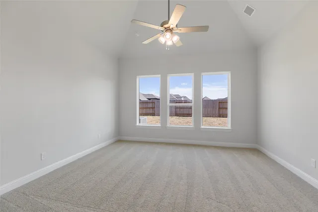 a view of a livingroom with a ceiling fan