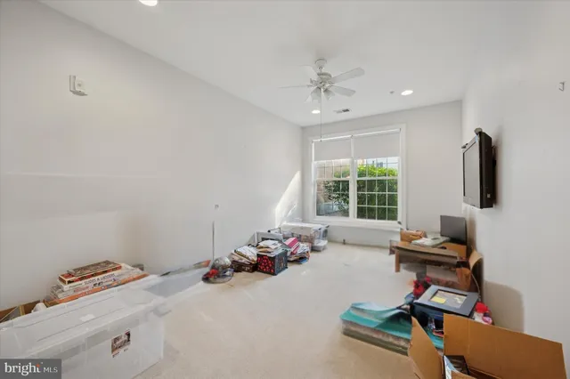 a room with furniture and a window