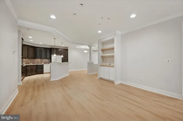 a view of kitchen with wooden floor