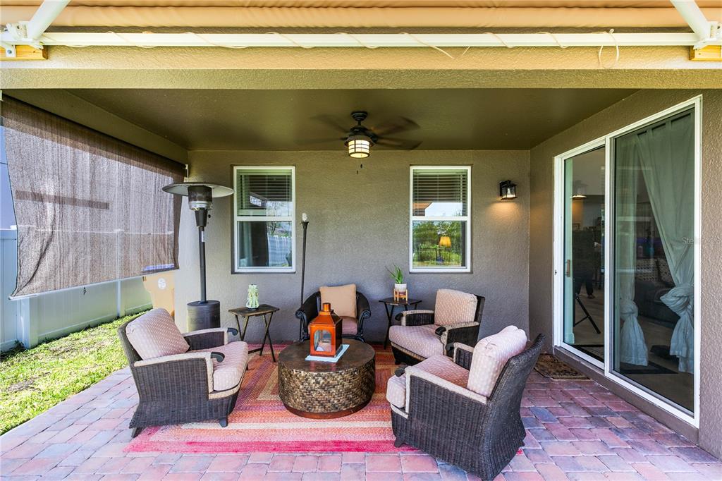 5637 Beggs Road St. Cloud, FL 34771 - Photo 29 of 35 a living room with furniture and a window