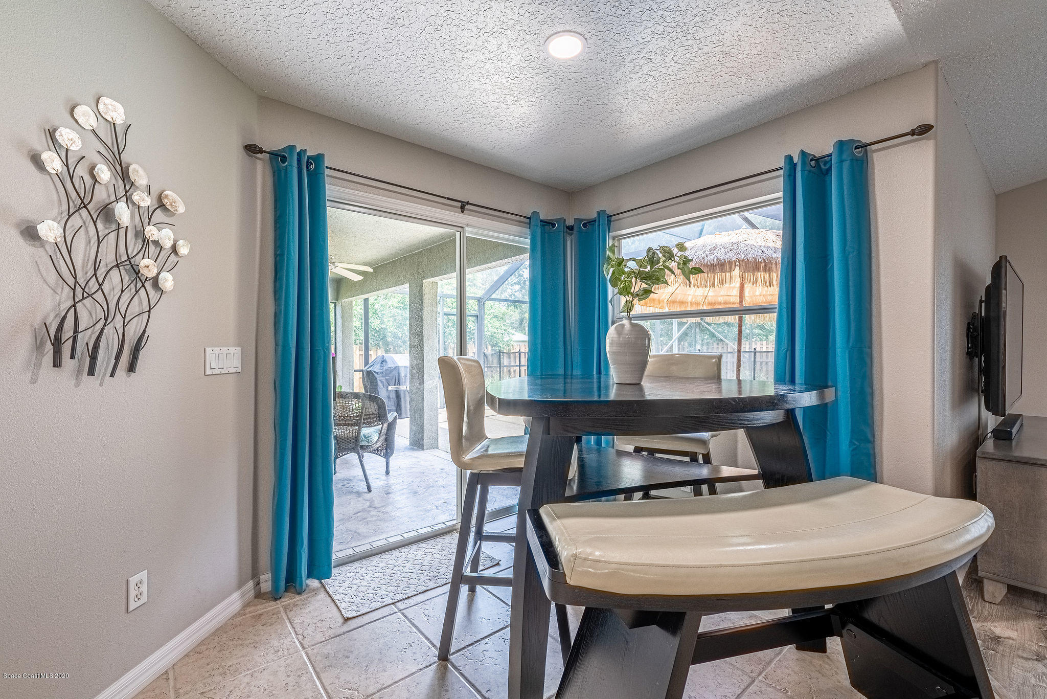 1253 Haulover Road Southwest Palm Bay, FL 32908 - Photo 29 of 52 a view of a dining room with furniture window and outside view