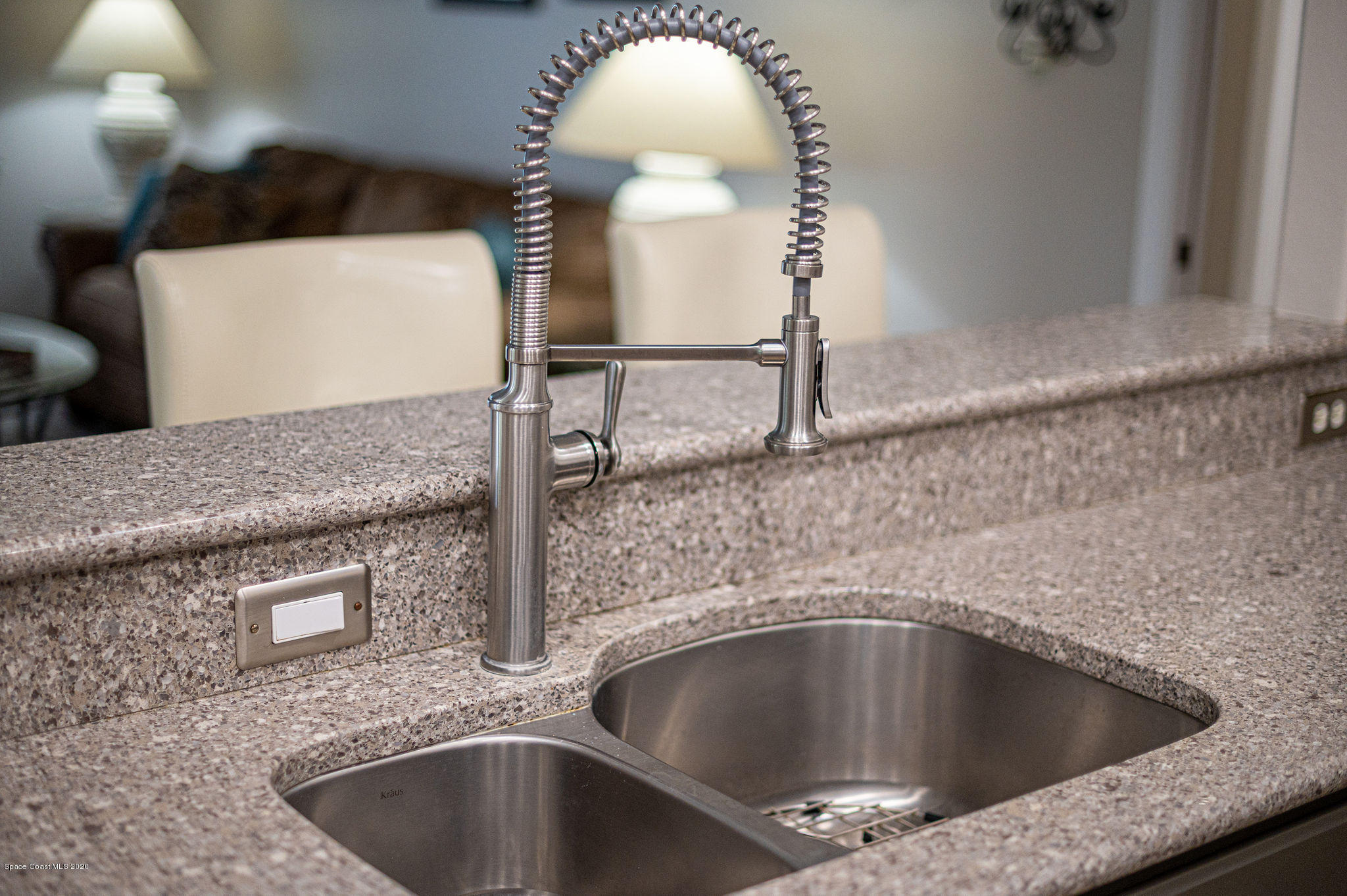 1253 Haulover Road Southwest Palm Bay, FL 32908 - Photo 40 of 52 a kitchen with a sink and a mirror