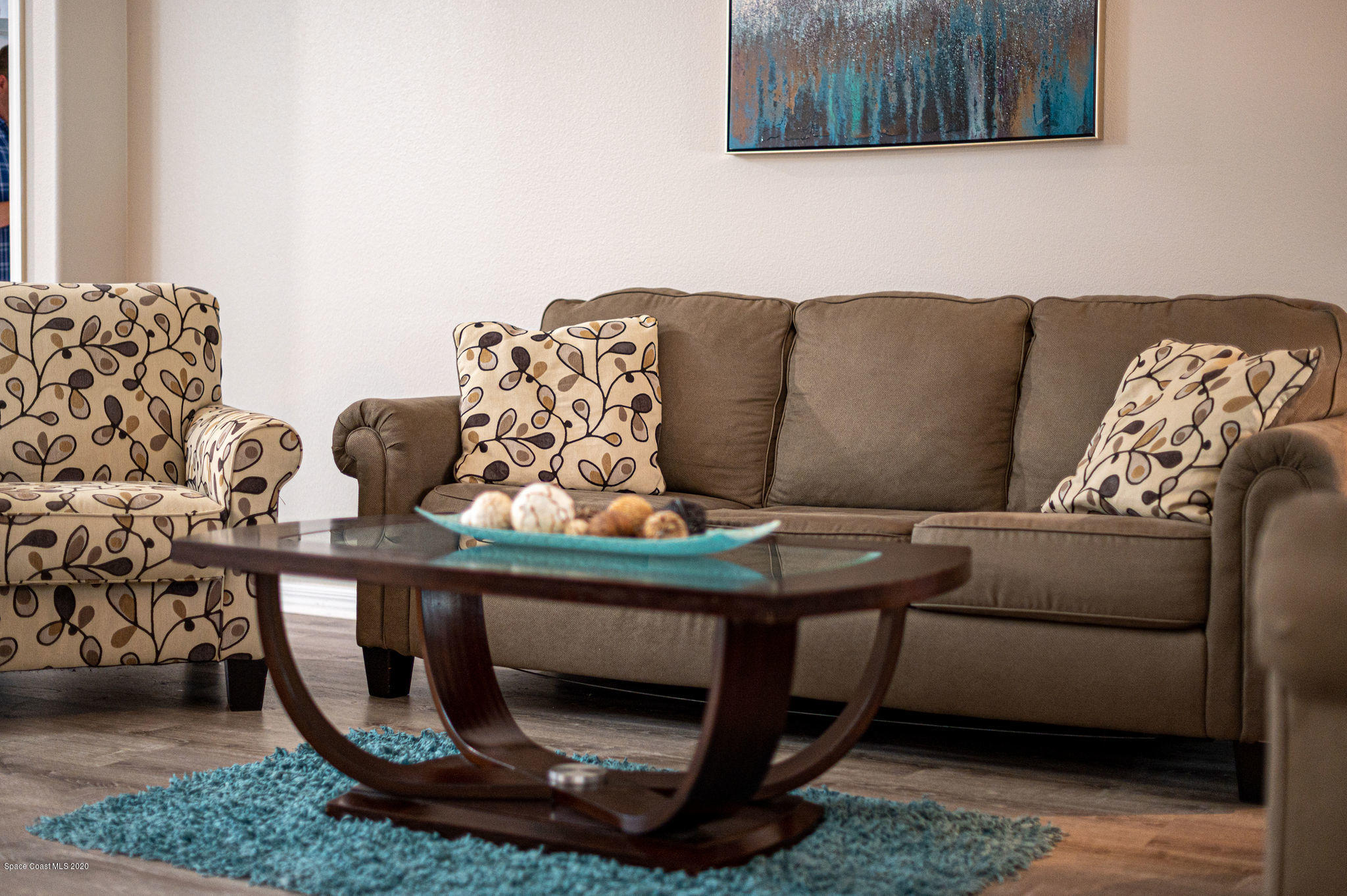 1253 Haulover Road Southwest Palm Bay, FL 32908 - Photo 46 of 52 a living room with furniture and a couch