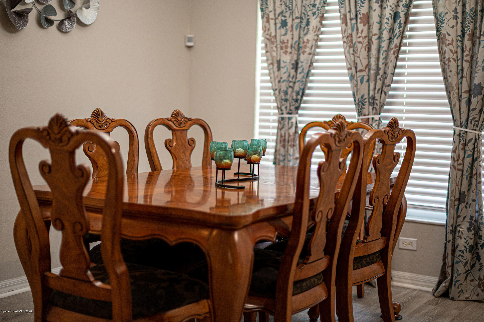 1253 Haulover Road Southwest Palm Bay, FL 32908 - Photo 47 of 52 a view of a dining room with furniture and window