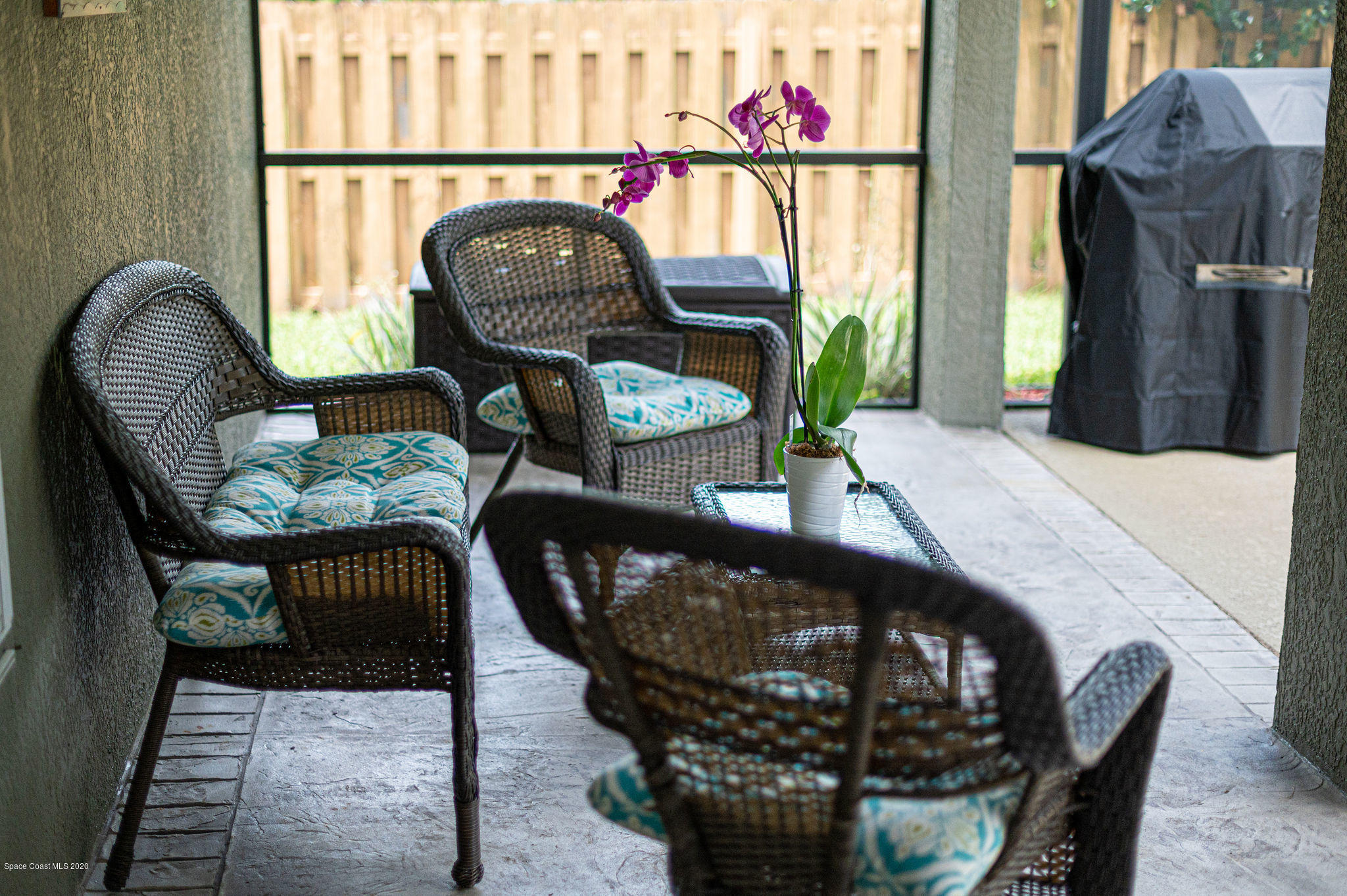 1253 Haulover Road Southwest Palm Bay, FL 32908 - Photo 52 of 52 a view of a chairs and table in the balcony
