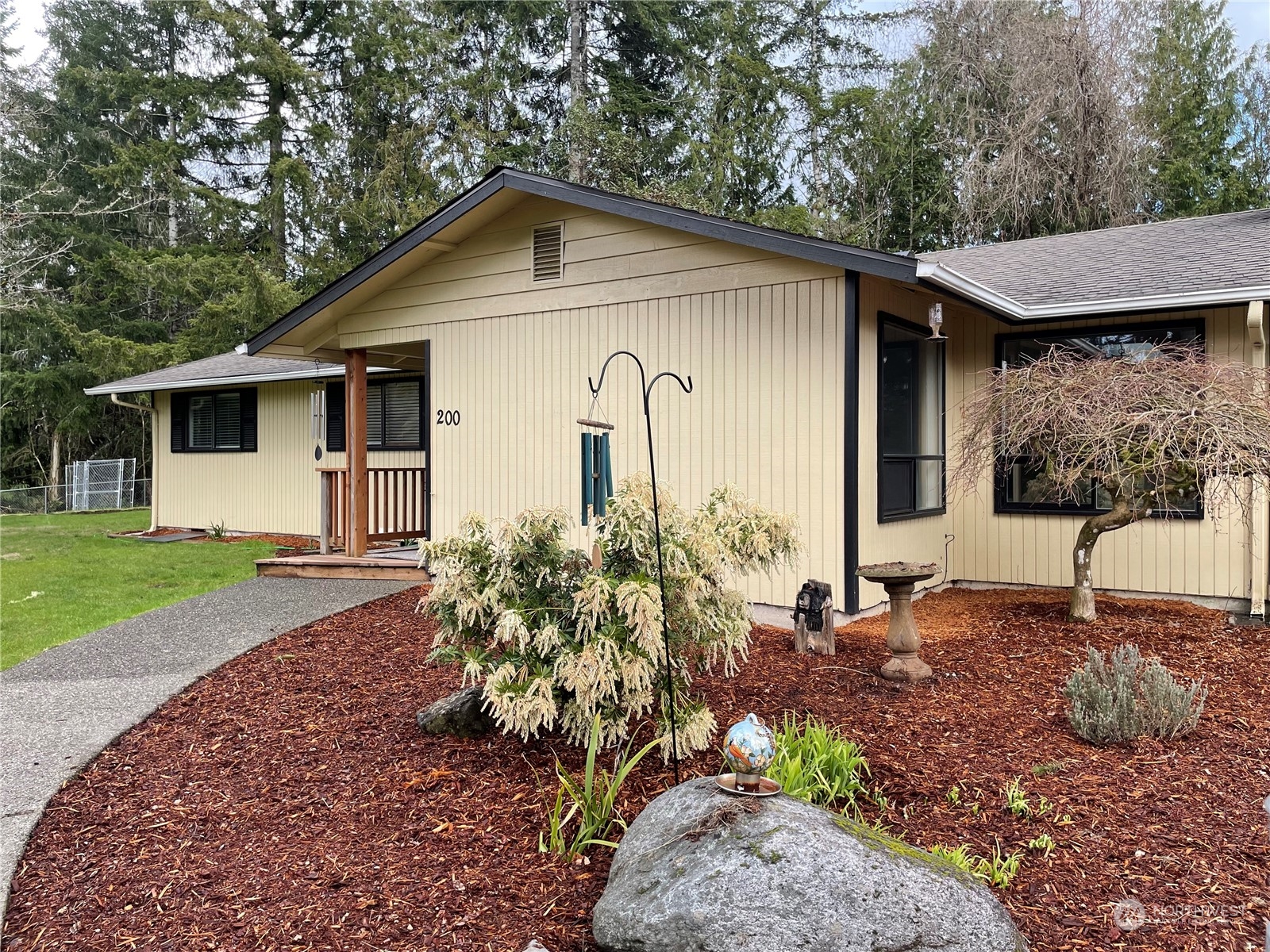 200 Southeast Harrier Road Shelton, WA 98584 - Photo 1 of 23 a front view of a house with garden