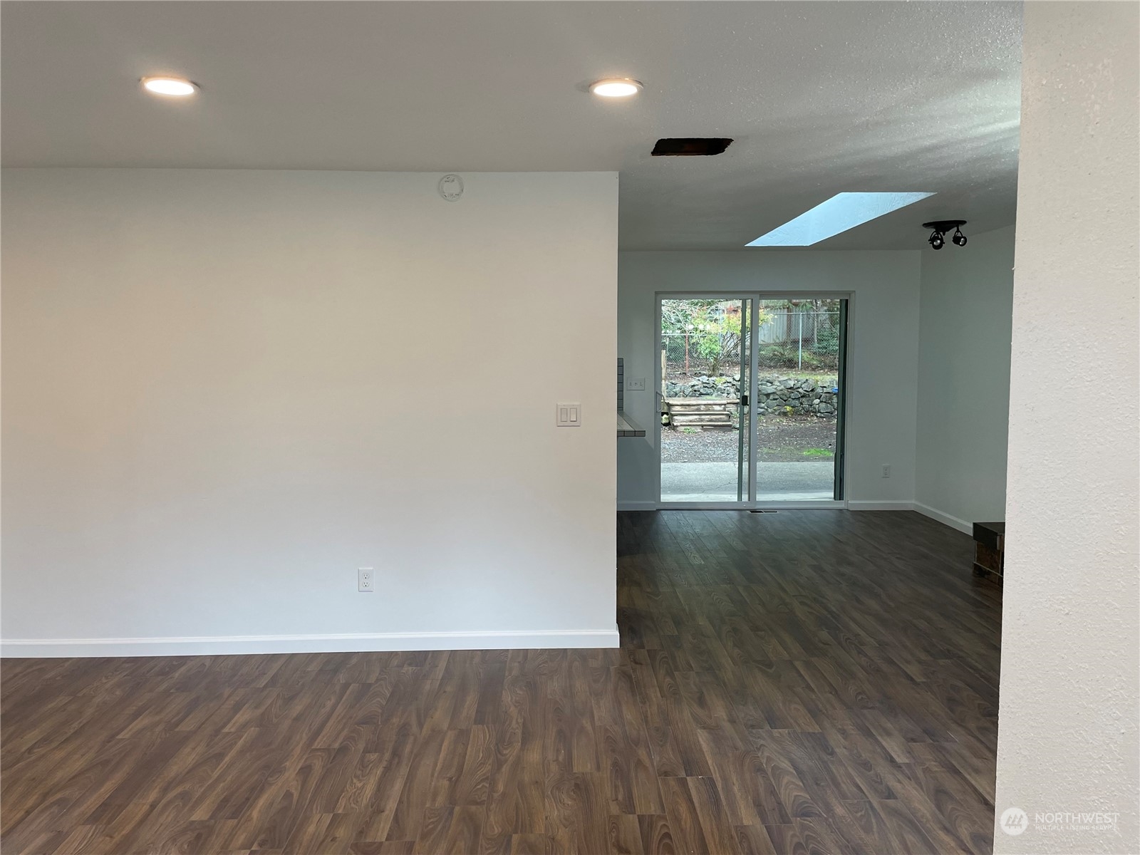 200 Southeast Harrier Road Shelton, WA 98584 - Photo 14 of 23 an empty room with wooden floor and windows