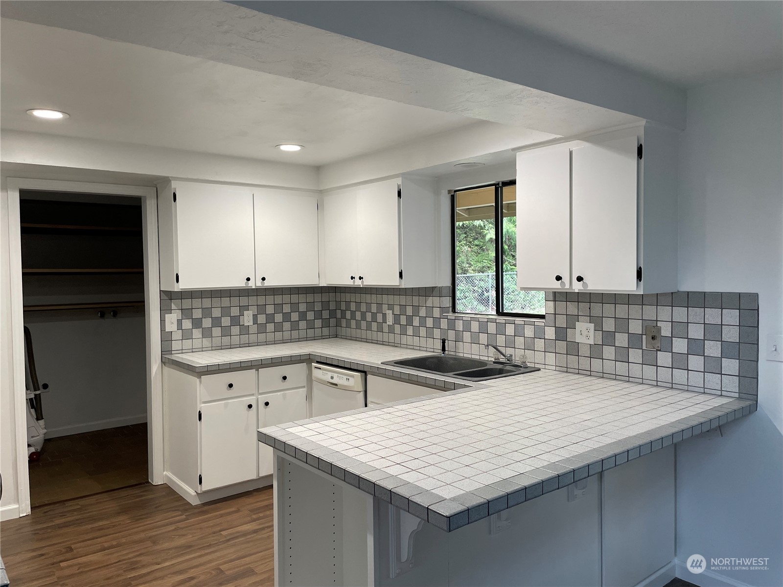 200 Southeast Harrier Road Shelton, WA 98584 - Photo 9 of 23 a kitchen with a sink a stove and cabinets