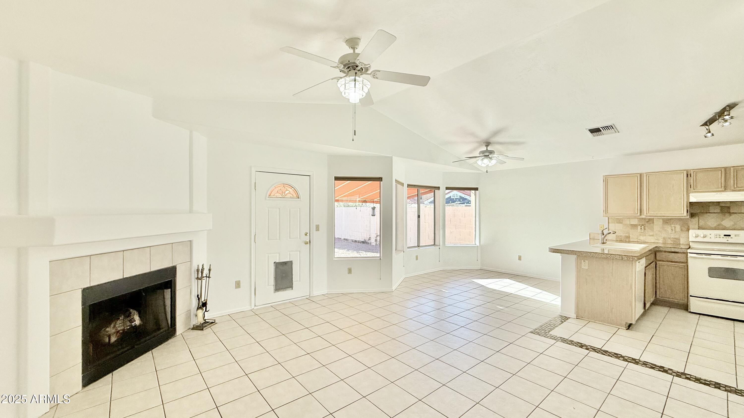 413 North Flint Street Gilbert, AZ 85234 - Photo 6 of 19 a spacious bathroom with a sink a mirror and a shower