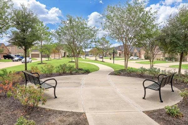 a view of a bench in a garden