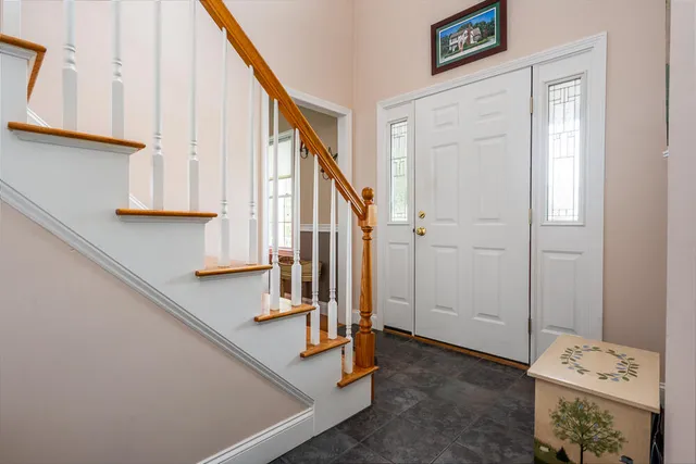 a view of an entryway with staircase
