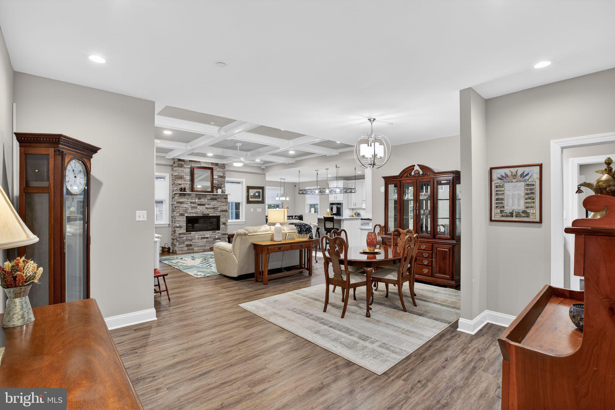 14730 Locust Court Swan Point, MD 20645 - Photo 14 of 30 a living room with furniture and a wooden floor