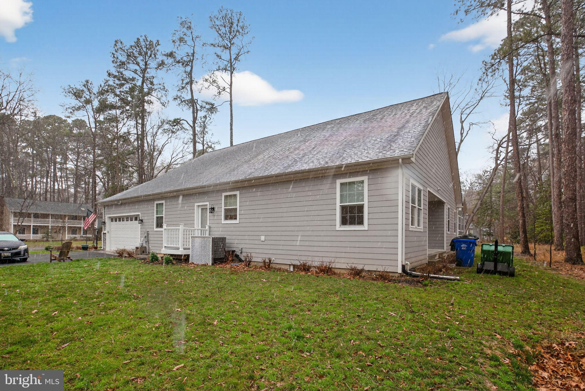 14730 Locust Court Swan Point, MD 20645 - Photo 29 of 30 a front view of house with yard and green space