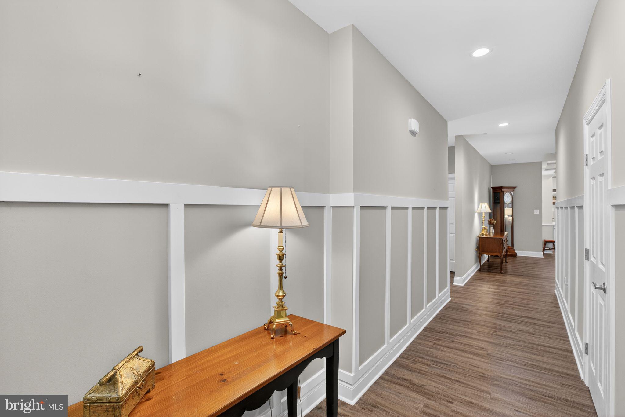 14730 Locust Court Swan Point, MD 20645 - Photo 3 of 30 a view of a hallway with wooden floor