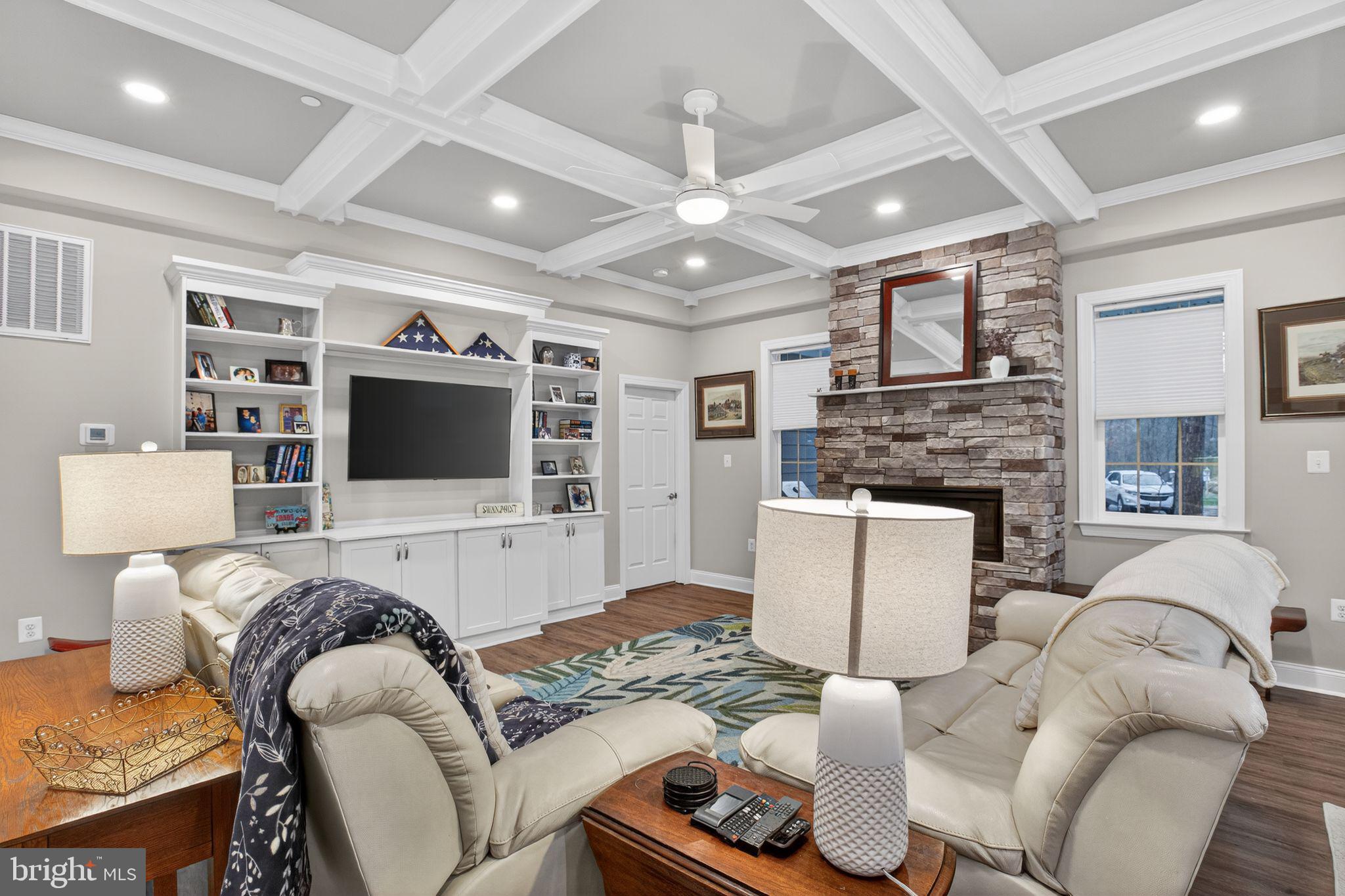 14730 Locust Court Swan Point, MD 20645 - Photo 4 of 30 a living room with furniture and a flat screen tv