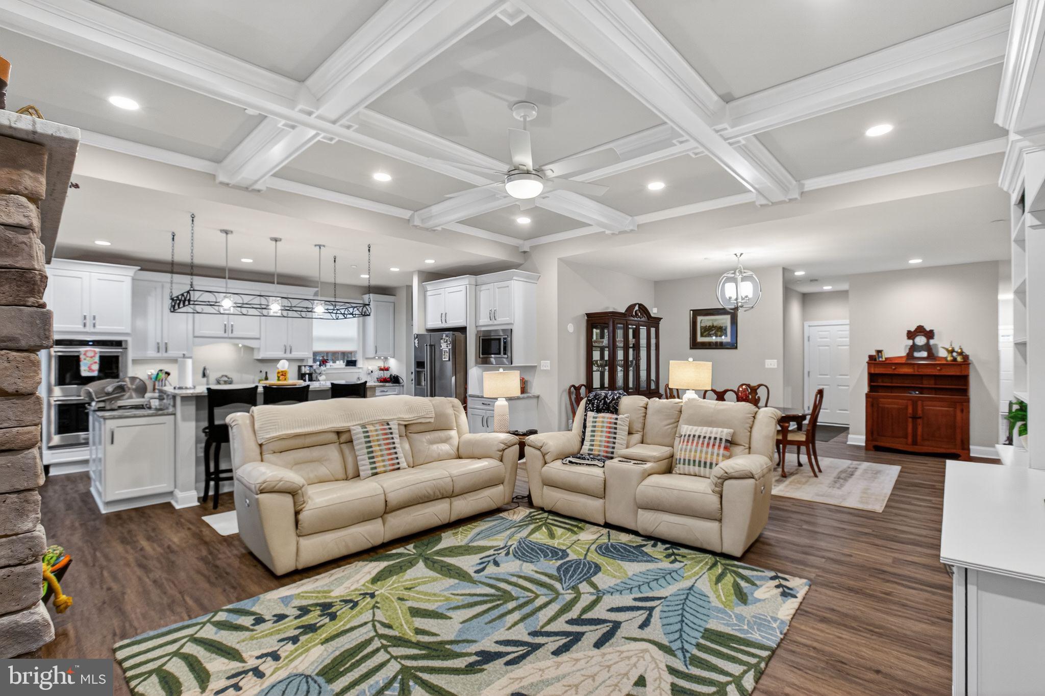 14730 Locust Court Swan Point, MD 20645 - Photo 7 of 30 a living room with furniture and kitchen view