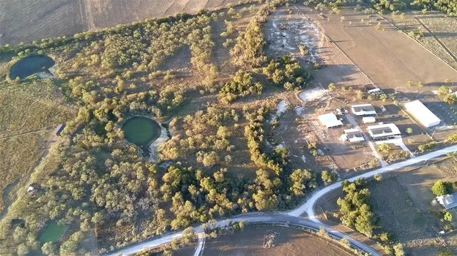 view of a wooden floor with a bench