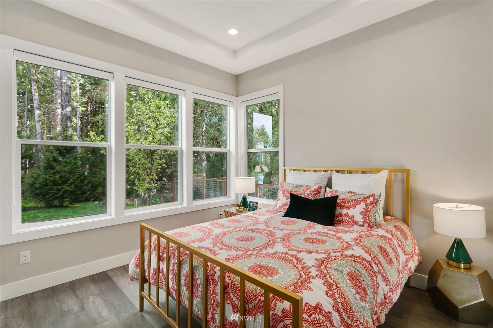 21899 Southeast 5th Place Sammamish, WA 98074 - Photo 14 of 35 a bedroom with a large bed and a large window