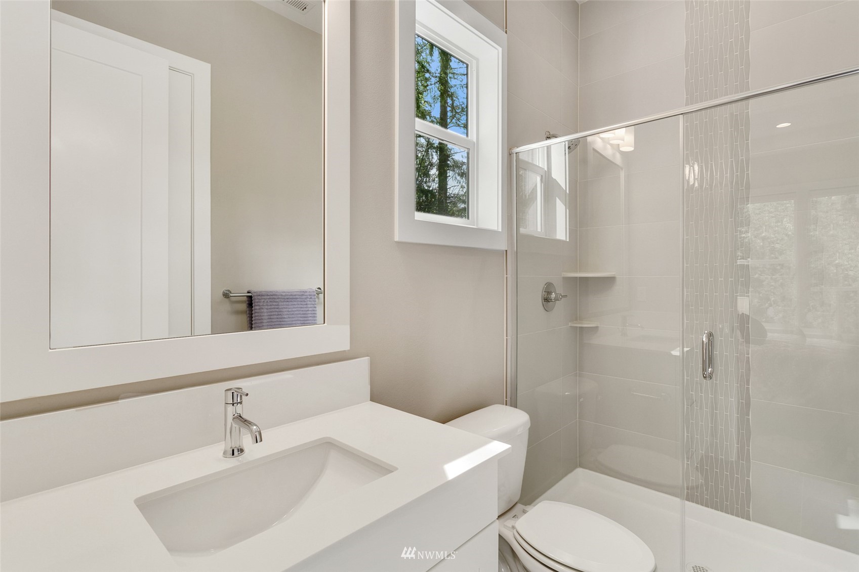 21899 Southeast 5th Place Sammamish, WA 98074 - Photo 15 of 35 a bathroom with a sink toilet and shower