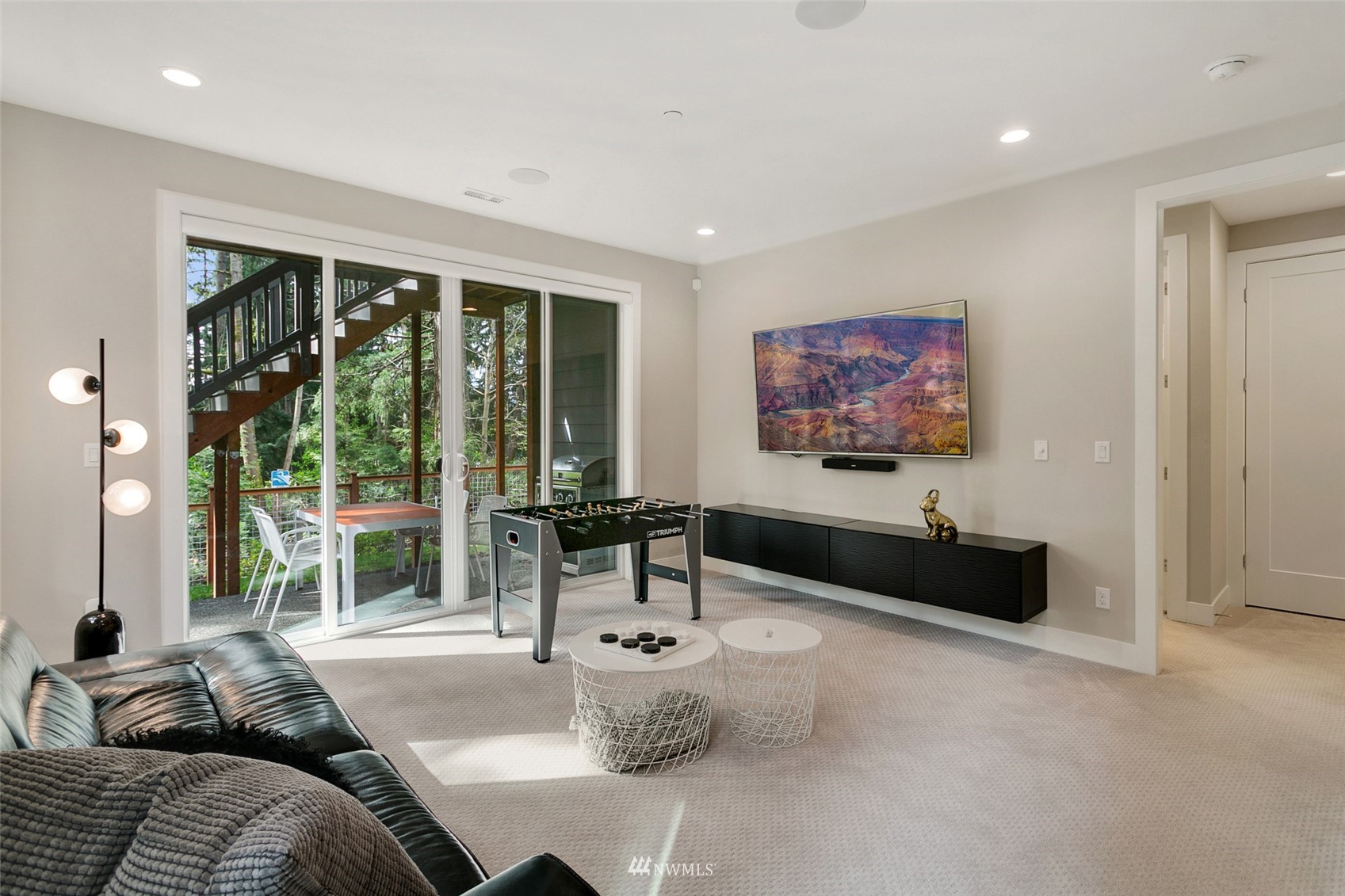 21899 Southeast 5th Place Sammamish, WA 98074 - Photo 25 of 35 a living room with furniture and a large window