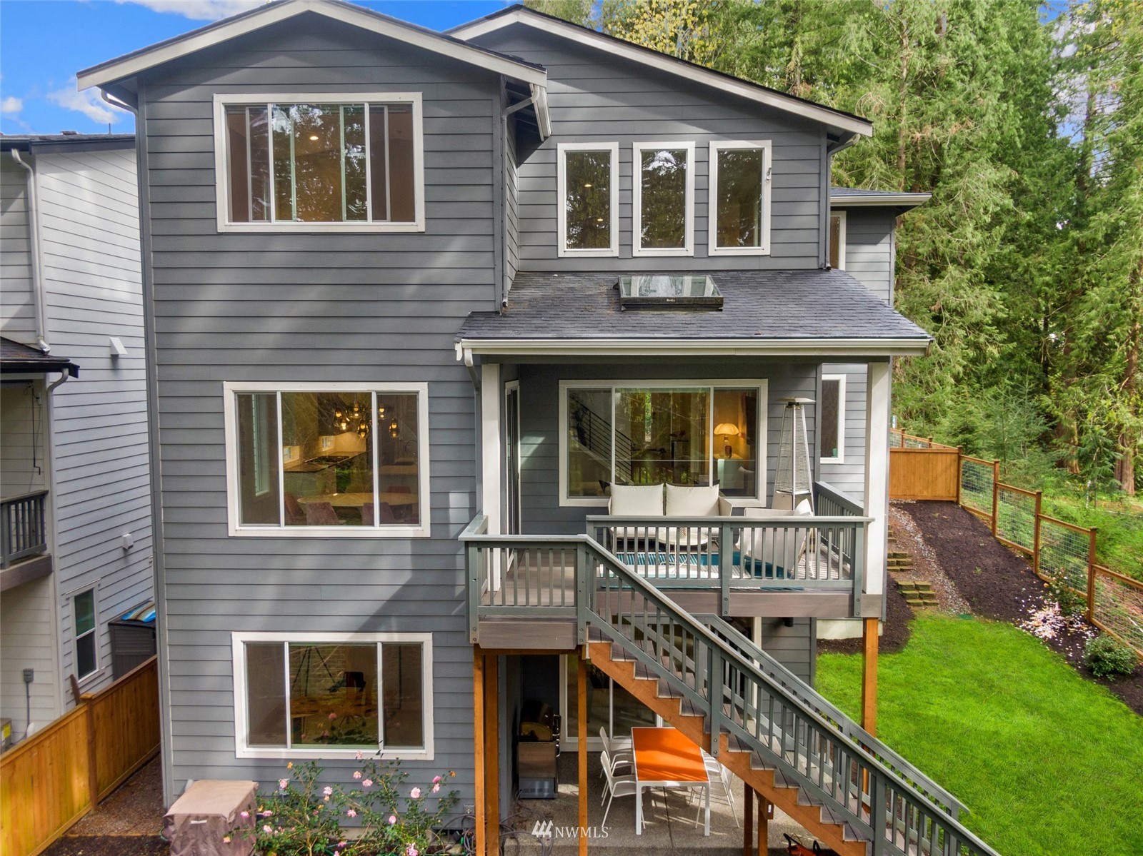 21899 Southeast 5th Place Sammamish, WA 98074 - Photo 30 of 35 a front view of a house with yard and porch