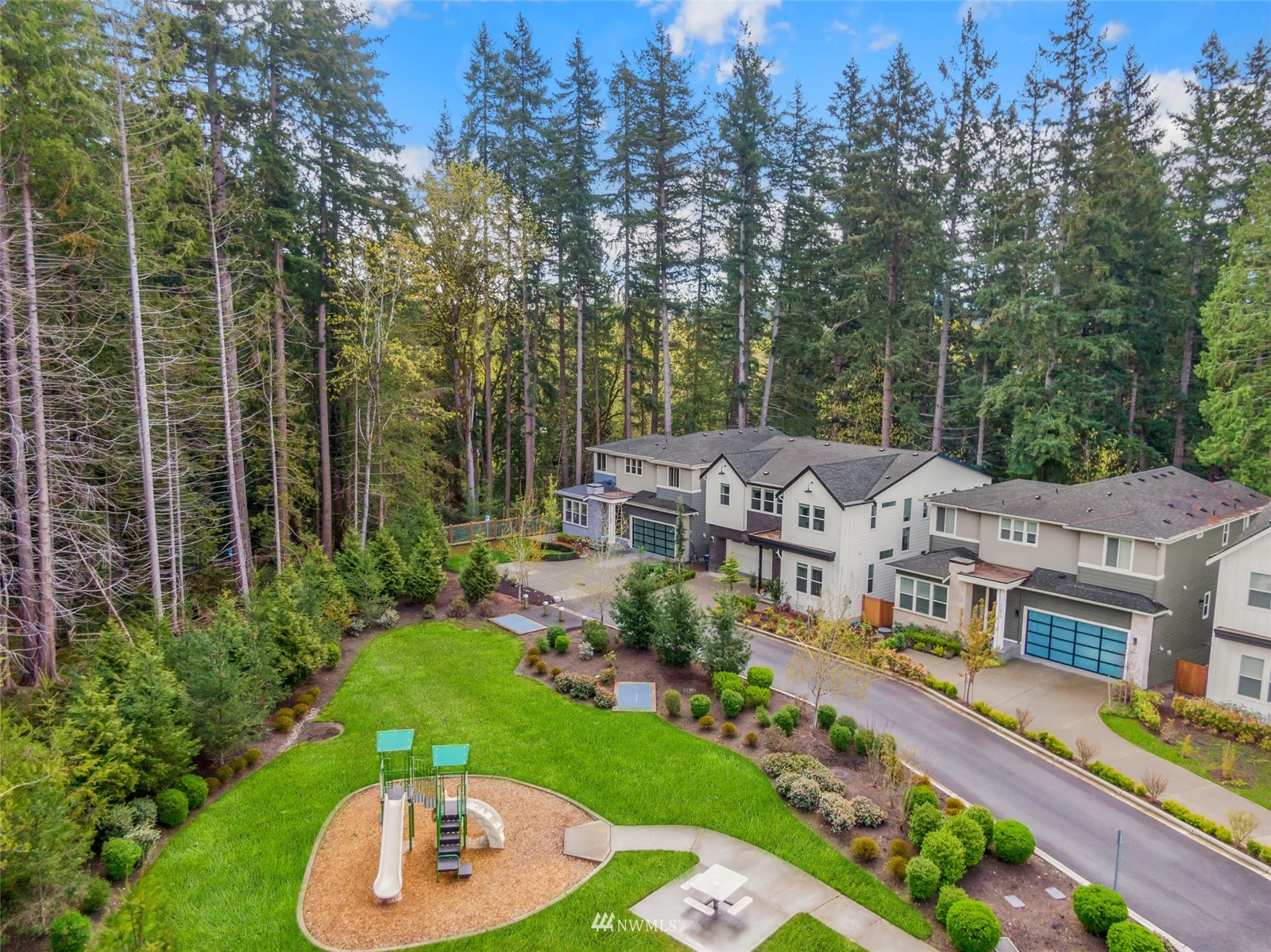 21899 Southeast 5th Place Sammamish, WA 98074 - Photo 33 of 35 an aerial view of multiple houses with a yard