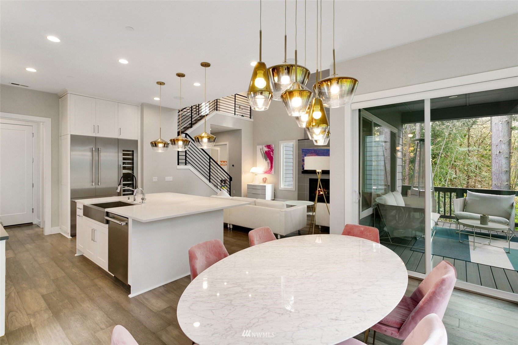 21899 Southeast 5th Place Sammamish, WA 98074 - Photo 10 of 35 a kitchen with stainless steel appliances granite countertop a stove and a refrigerator