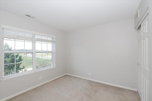 10049 Cummings Street Huntley, IL 60142 - Photo 25 of 30 an empty room with a window