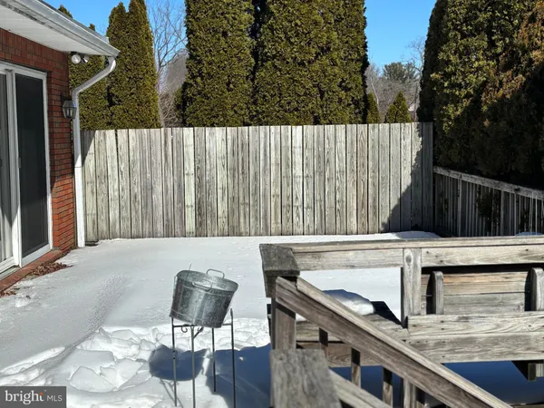 a view of balcony with wooden floor