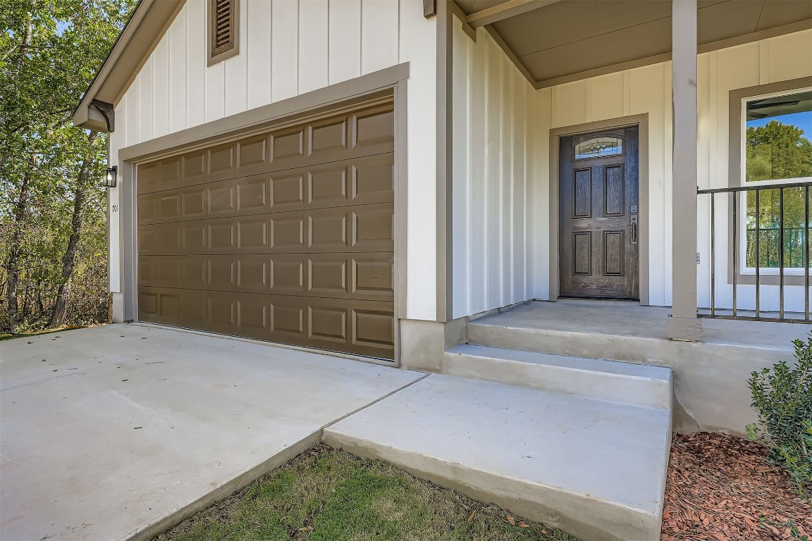 701 East 3rd Street Elgin, TX 78621 - Photo 3 of 28 Garage with driveway