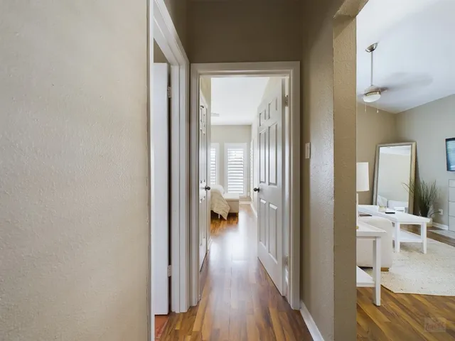 a view of living room with wooden floor