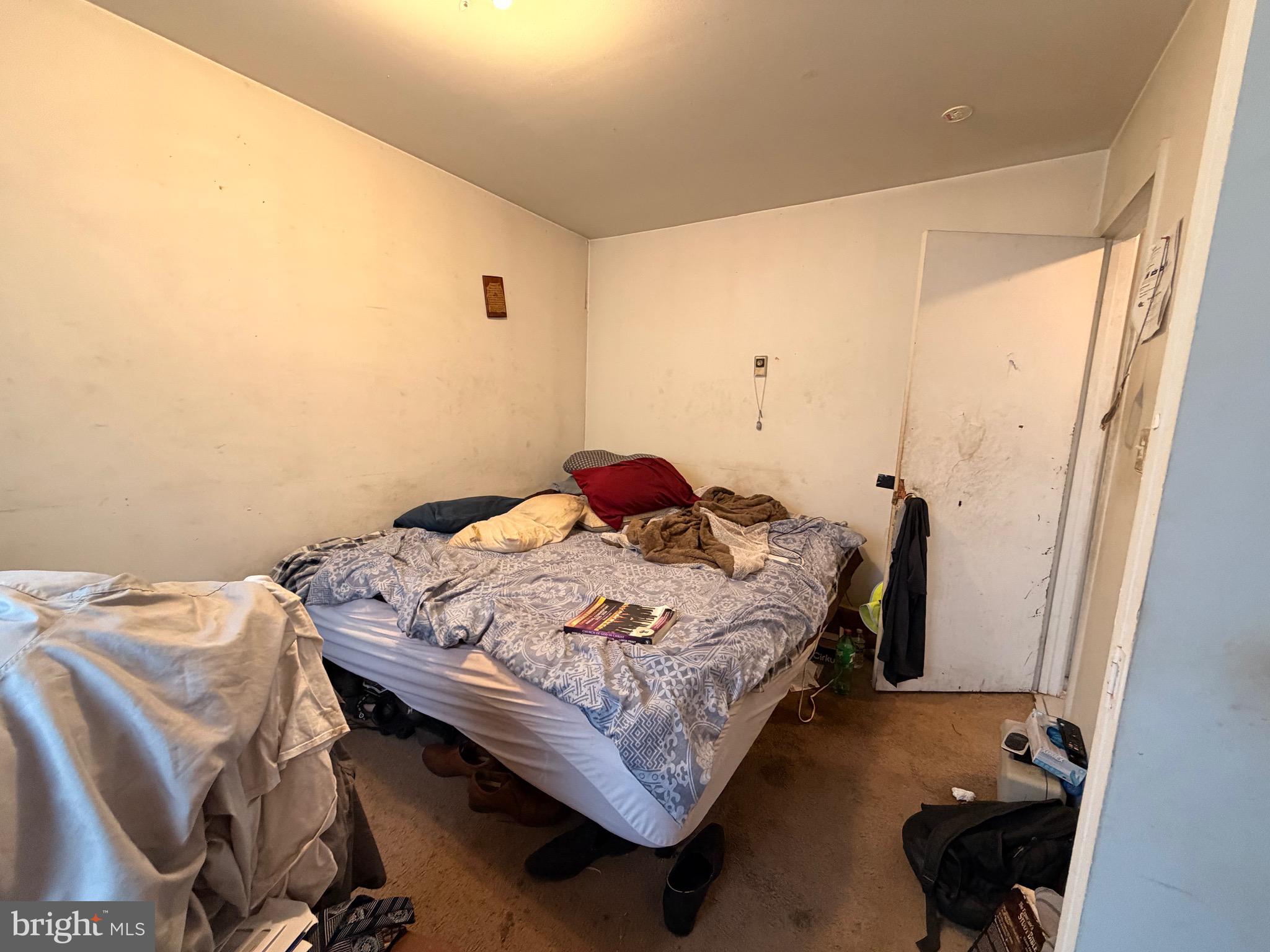 5 West Chestnut Street Delmar, MD 21875 - Photo 13 of 28 a bedroom with a bed and a window