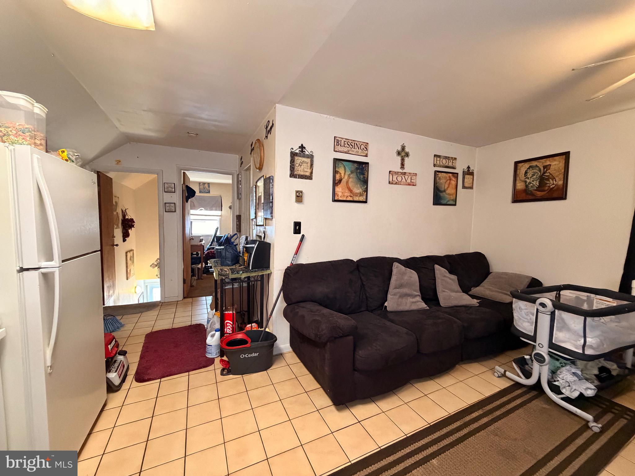 5 West Chestnut Street Delmar, MD 21875 - Photo 18 of 28 a living room with furniture and a couch