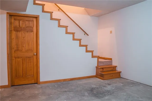 a view of entryway with stairs