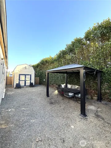a view of a house with backyard from a tub