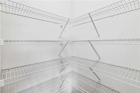 a bathroom with a shower and a shower head