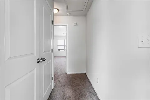 a view of a hallway with a elevator