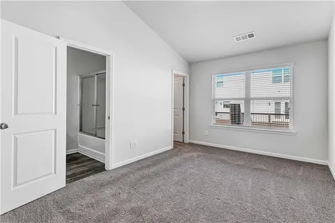 a bathroom with a toilet a sink and a bathtub