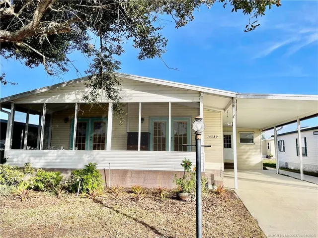 front view of a house with a small yard