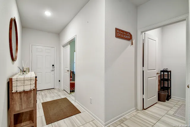 a area with furniture and wooden floor